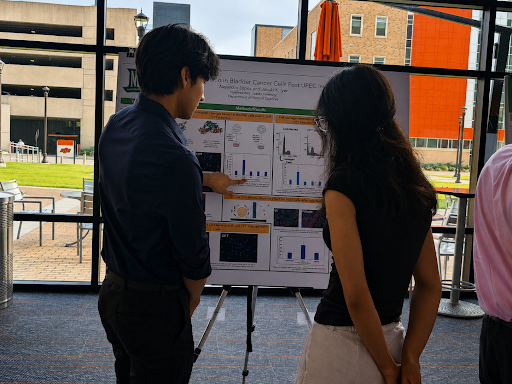 Alejandro Lopez explains his poster. 