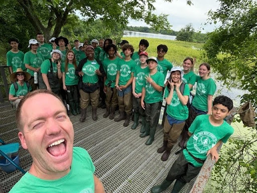 Drs. Pamela Christol and Nathan Green lead a team of middle school students on a field survey of bodies of water at the Mary K. Oxley Nature Preserve in Tulsa, OK.