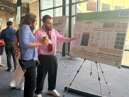  Lucas Miller presents his poster.