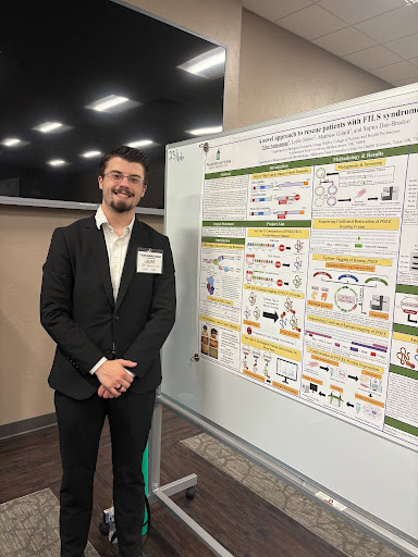 Tyler Armstrong with his poster at the NISBRE Symposium in Washington, D.C.