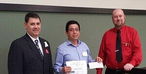 Institute for Supply Management David Young presents scholarhips to Nelson Rojas-Basante