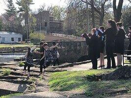 NSU singers, and impression dance company students by Town Branch Creek NSU singers, and impression dance company students by Town Branch Creek