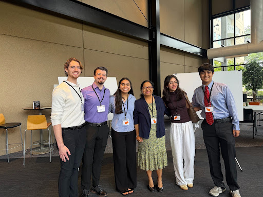  Dr. Das-Bradoo with her summer research students at the symposium