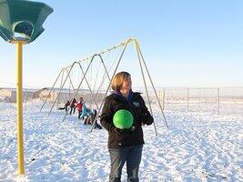 Dawn Davis at snow covered playground