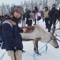 Trent Morgan petting reindeer
