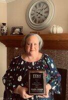 Dr. Jennifer Edwards with award Dr. Jennifer Edwards with award