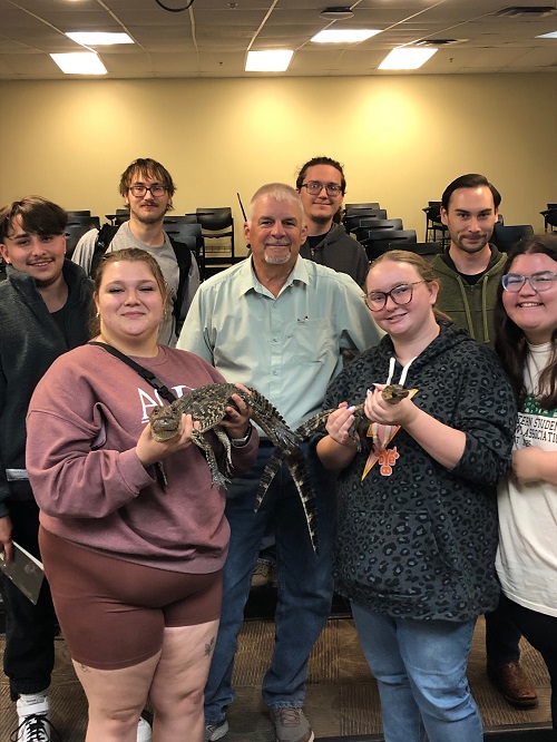 Dr. Merchant (center) brought some "special guests" with him to interact with the students at the seminar.