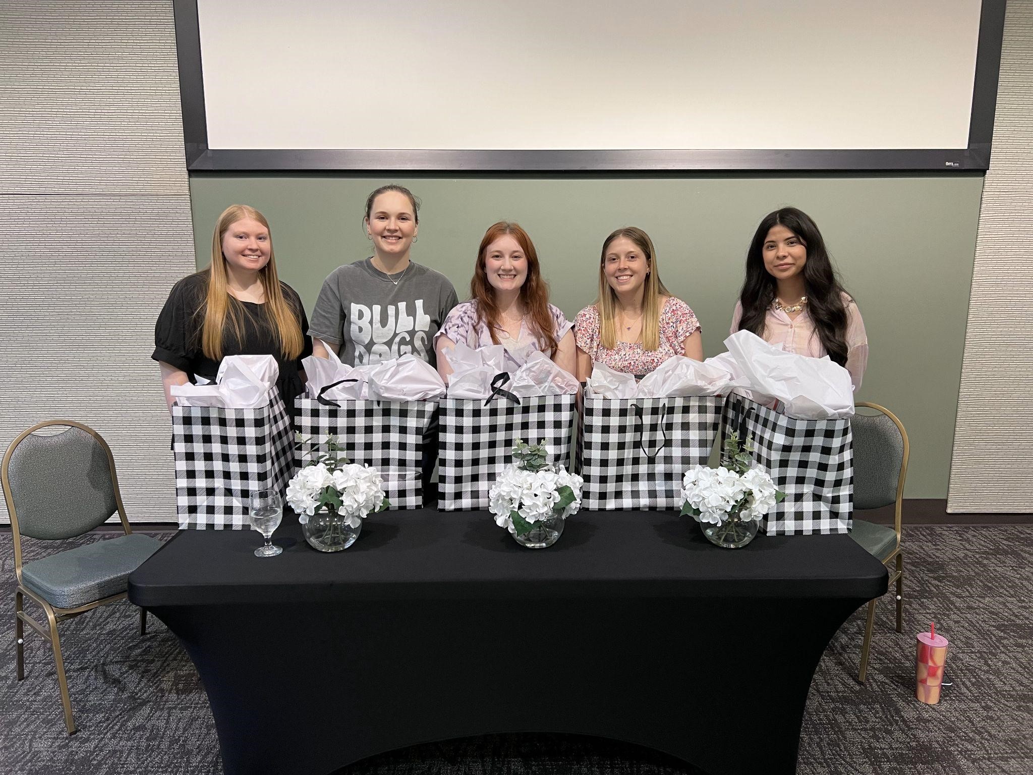 Graduating Noyce Scholars pictured with Alessandra Criscione, a former Noyce Scholar Graduating Noyce Scholars pictured with Alessandra Criscione, a former Noyce Scholar