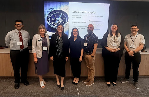 Dr. Doris Feltham, second from left, Dr. Megan Weinkauf, third from left