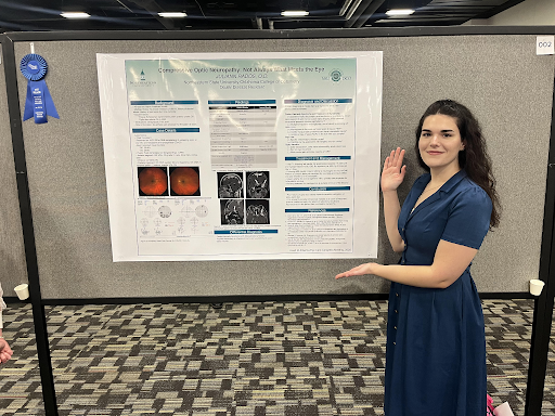 Dr. Juliann Rados with her award winning poster