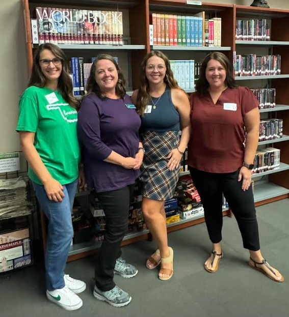 Dr. Alesha Baker (Library Media) and Dr. Heidi W. Jenkins (Library Media) along with NSU Graduates, Muranda Hollie and Misty Boston