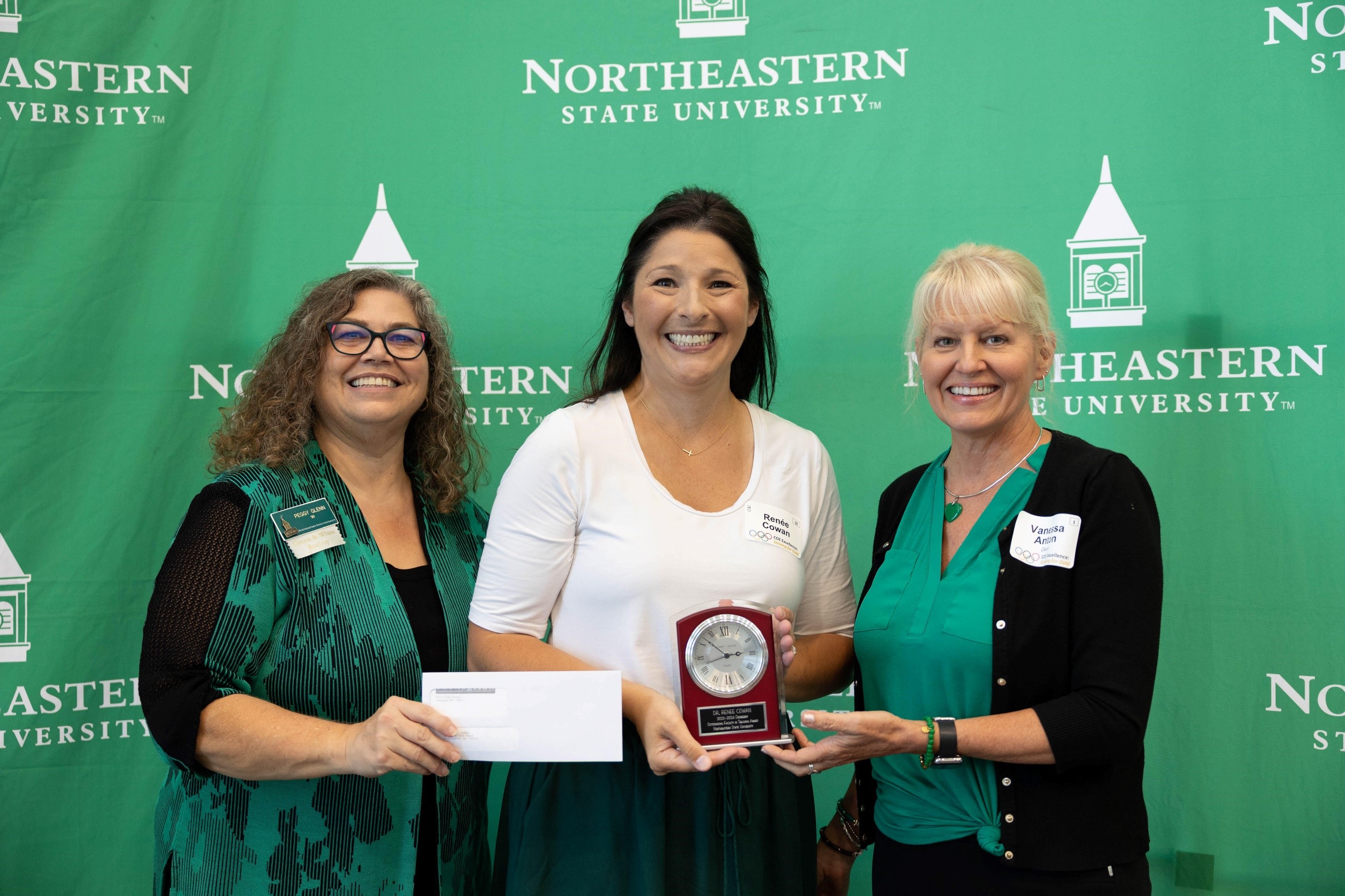 Dr. Renee Cowan receiving award.