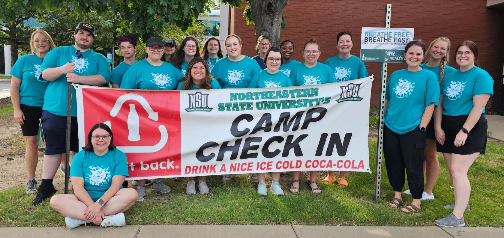 Camp Check In (See pictured, Dr. Hobson far left, back row.)