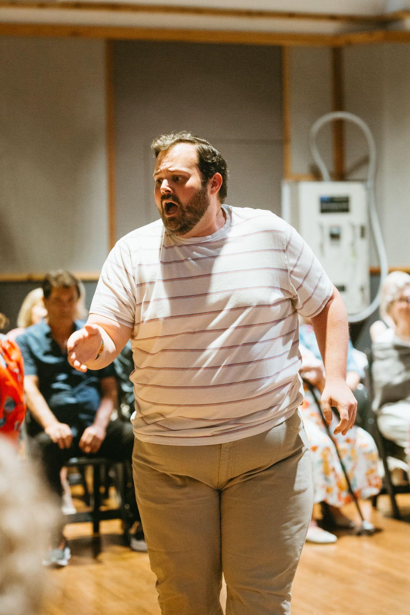 Justin Kroll performing as Larry in Tulsa Opera's production of The Face on the Barroom Floor at Church Studios in Tulsa, Oklahoma