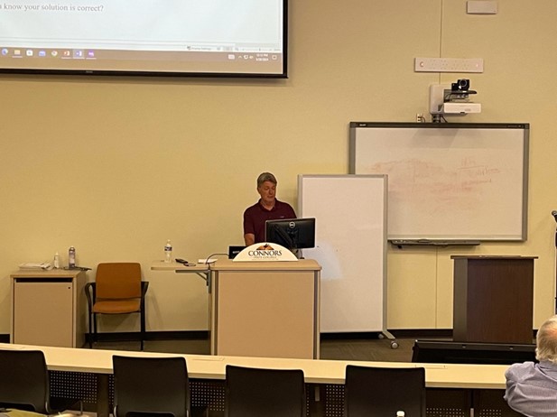 Dr. Karl Kruczek at the workshop titled “Productive Struggle, Persistence & Perseverance: Creating Activities to Enhance College Mathematics,” at Connors State College May 28th.