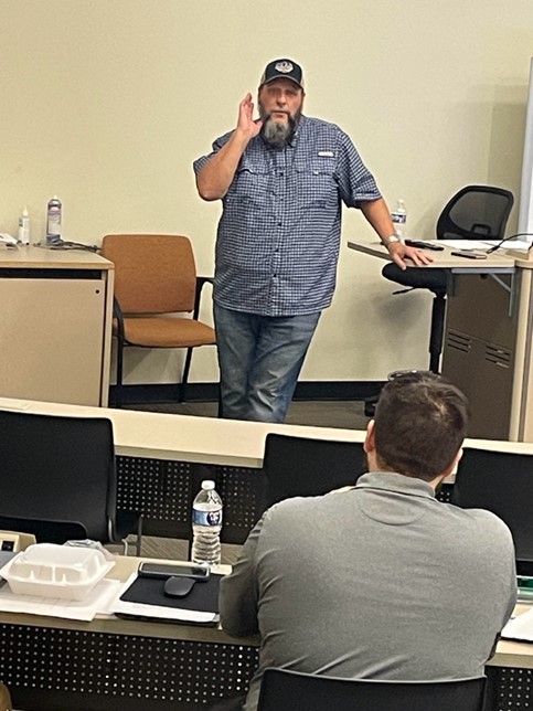 Dr. Luke Foster at the workshop titled “Productive Struggle, Persistence & Perseverance: Creating Activities to Enhance College Mathematics,” at Connors State College May 28th.