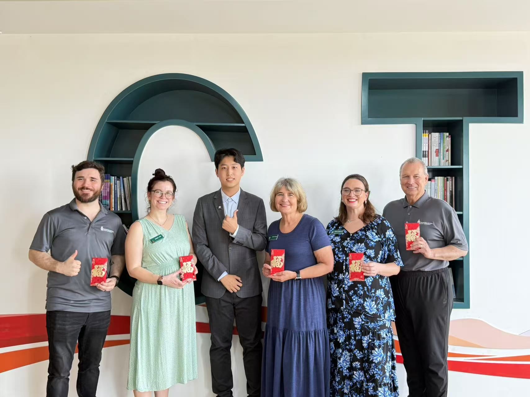 Left to right: Instructor Tyler Utt, Instructor Sydney Rice, Student Bai Lige, Dr. Doris Feltham, Dr. Megan Weinkauf, Dr. Rick Wallace