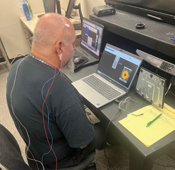 Dr. Johnny Kirk during EEG training from the Brain Institute. 