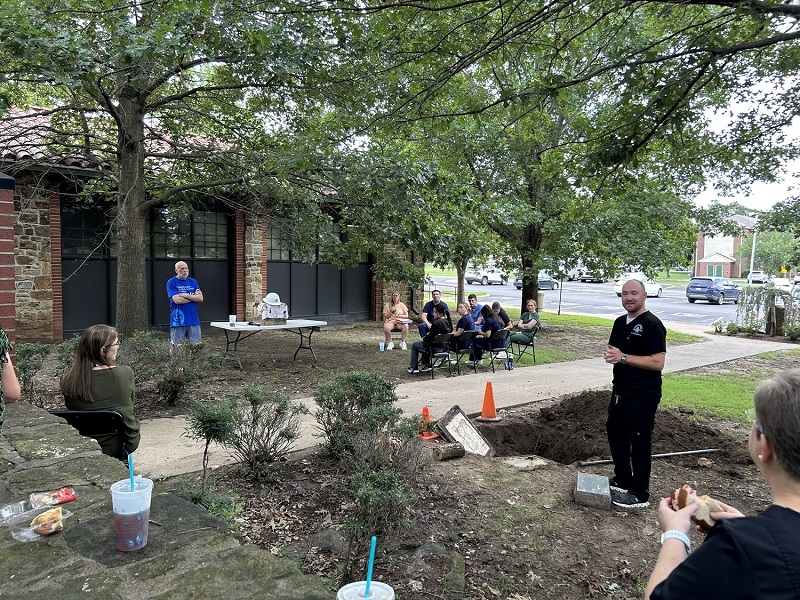 Dean, Dr. Nate Lighthizer, near the time capsule dig site at the old building.