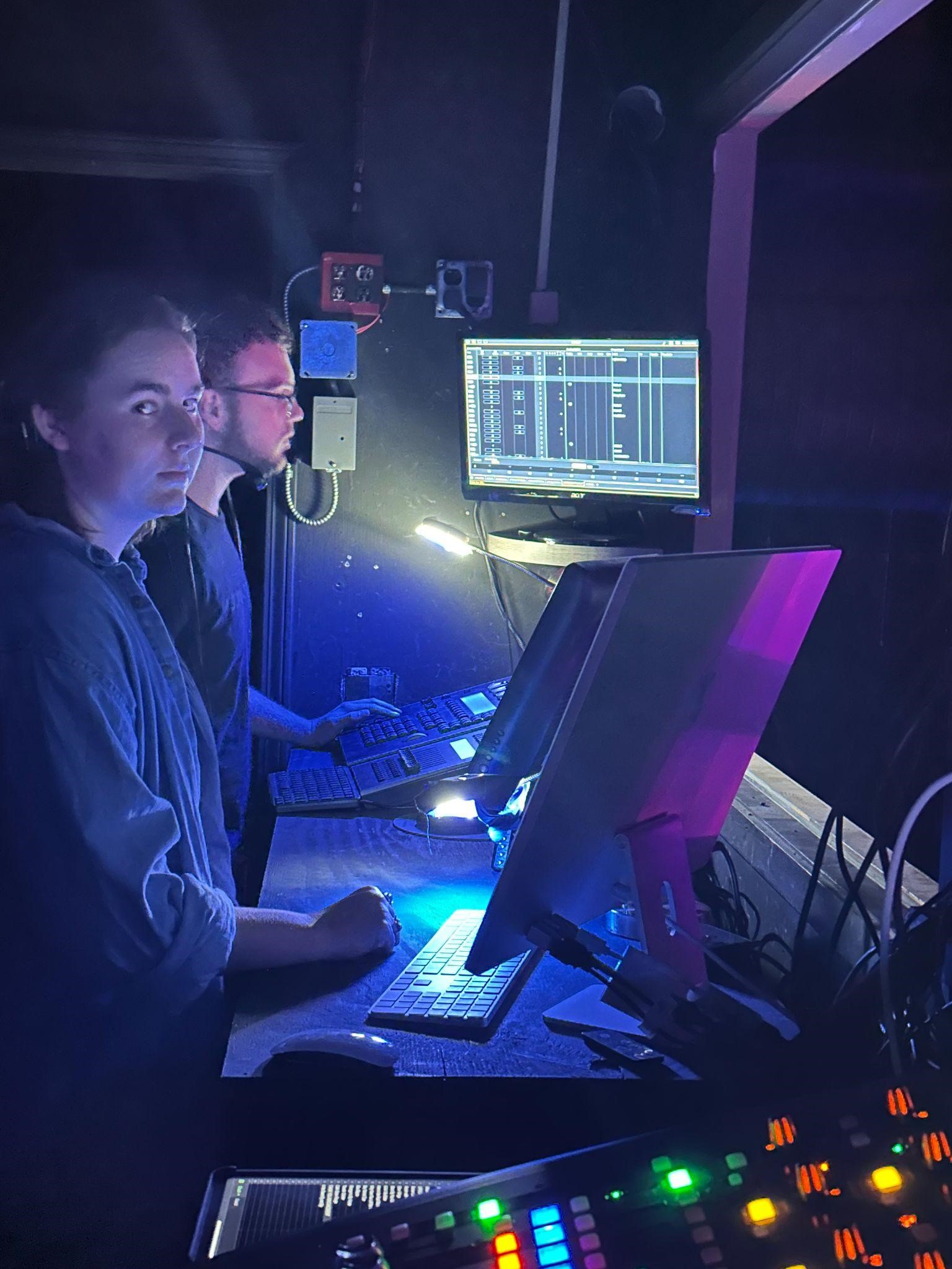 UA student Katie Pursley of Tahlequah (left) running video, NSU student Elijah Ritter of Claremore (right) running lights
