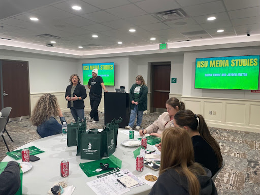 Cassie Friese, Instructor of Media Studies, speaking with students.