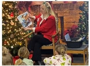 Dr. Kim Phillips reading to 2nd grade students