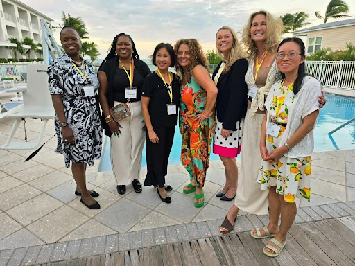 Dr. Julia S. Kwok (center) with fellow Best Presentation Award recipients at the Academy of Business Research Conference in Key West, Florida.