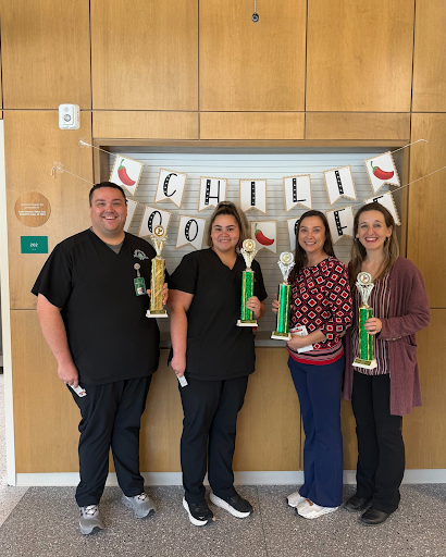 Winners (L to R):Josh Smith (staff) , Bailey Jones (student worker), Brittney Mason (staff), Dr. Madison Rhoton (faculty)