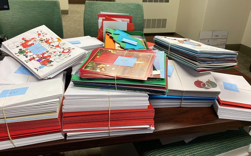 Stacks of Christmas cards provided by NSU