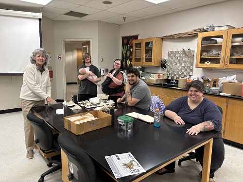 Dr. Strawn, Zak Blackwell, Ashton Blackwell, Ben Woolen, and Dr. Waring in the lab at UCO identifying lichens from the collection.