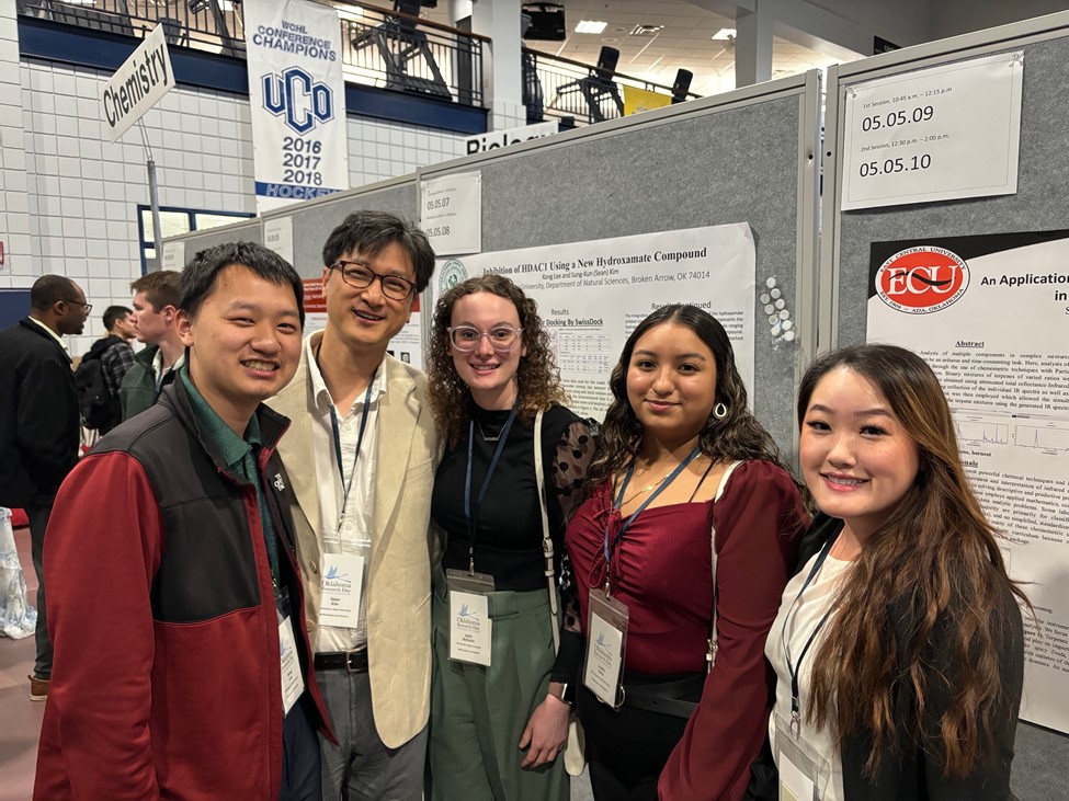 Dr. Kim and students at Oklahoma Research Day at UCO (from left to right: Kong Lee, Dr. Kim, Jayla McGuire, Leslie Ortiz, and Kaliana Lee)