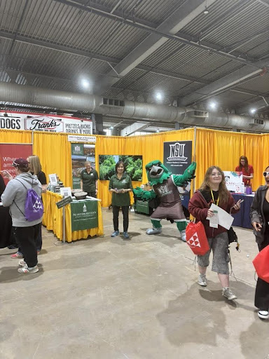 Instructor Tracy Baldwin dr. Julia Kwok and Instructor Tyler Utt aka Rowdy the Riverhawk