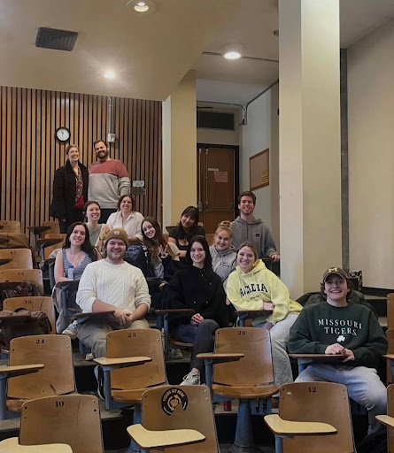 Justin Kroll and Christina Ray (top) with students from the Ray studio at the University of Missouri.