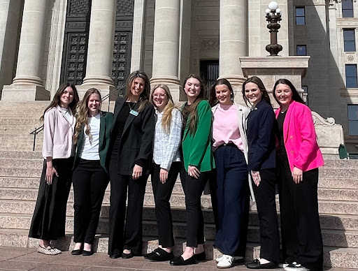 Kirsten Kelly, Lydia Schultz, Ashley Talburt, Jordan Lambert, Anniston Baker, Hannah Soler, and Amanda Good pictured on the front steps of the Oklahoma State Capitol for OSHA Advocacy Day.