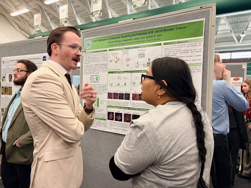 Shane Holmes presenting his poster at Oklahoma Research Day