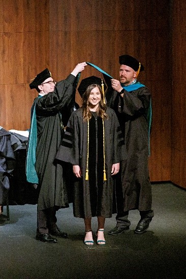 NSUOCO student receiving sash