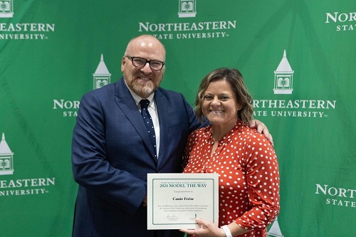 Dr. Hanley giving award to Cassie Freise