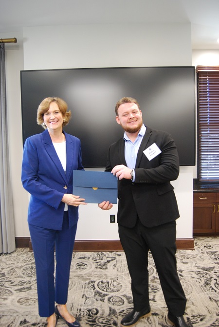 William Winston with Chancellor Allison Garrett.