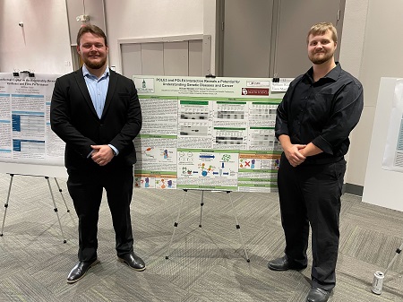 William Winston and Jason MacDonald presenting their research poster at the URD