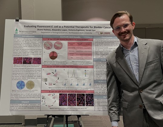 Shane Holmes, an undergraduate student, presented his research conducted in Dr. Janaki Iyer’s laboratory at NSU’s Undergraduate Research Day. Shane Holmes, an undergraduate student, presented his research conducted in Dr. Janaki Iyer’s laboratory at NSU’s Undergraduate Research Day.