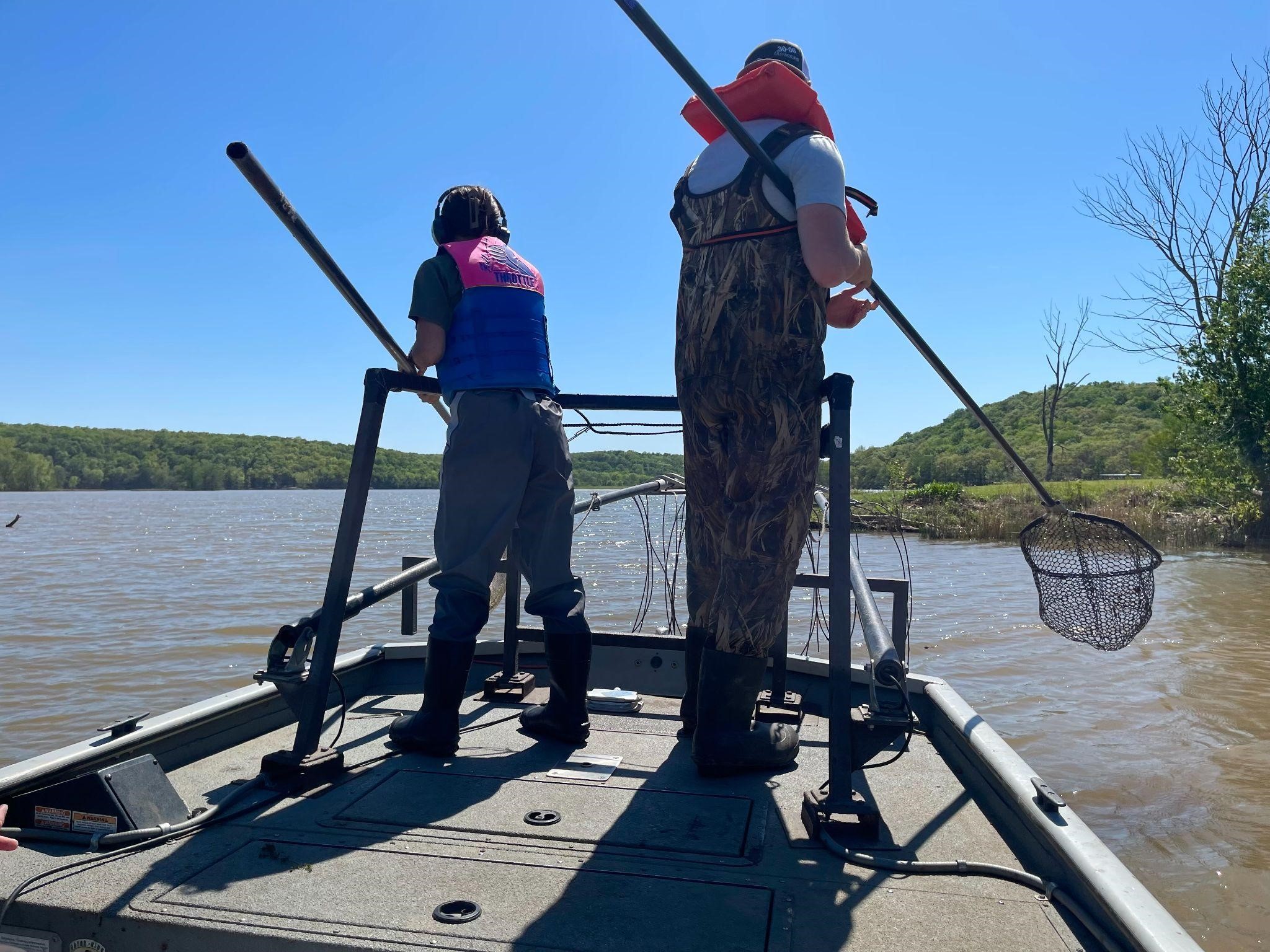 students on boat Josie Moore and Robert Etter