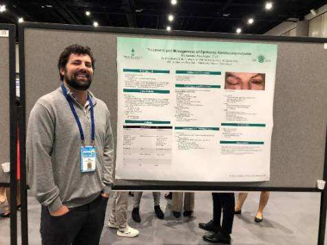 Dr. Alexander Kinsinger presenting his poster at the American Academy of Optometry 2022.