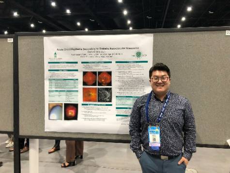 Dr. Cedrick Mah presenting his poster at the American Academy of Optometry 2022.