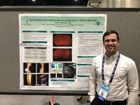 Dr. Cole Sutherland presenting his poster at the American Academy of Optometry 2022.