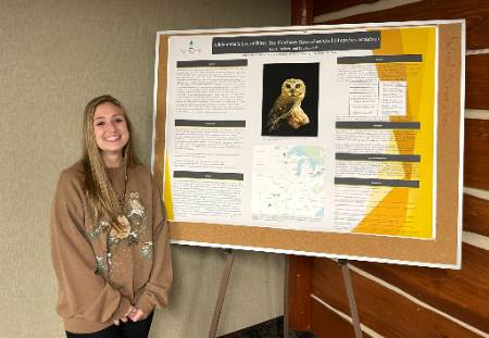 Laura Courser with her poster.