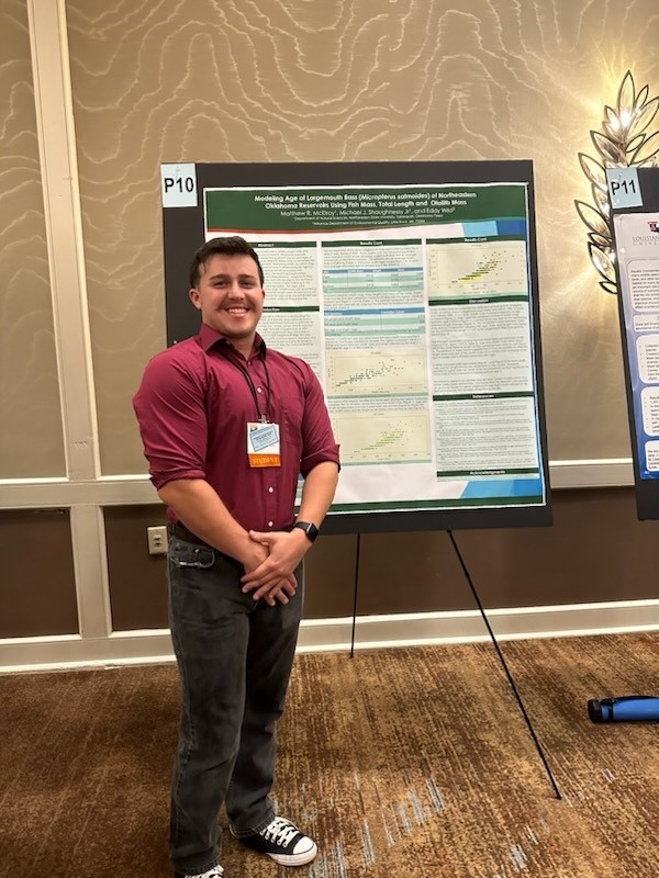 Matt with his poster was entitled, "Modelling Age of Largemouth Bass (Micropterus salmoides) of Northeastern Oklahoma Reservoirs Using Fish Mass, Total Length and Otolith Mass"