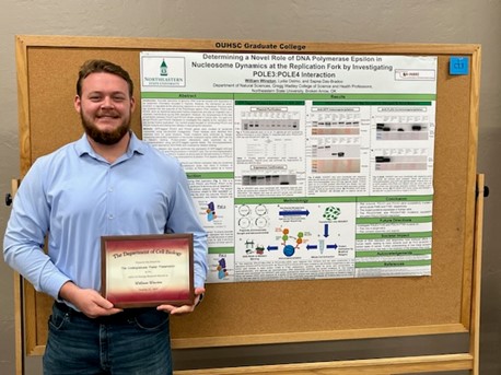 Will with his poster and award for winning the undergraduate poster section.