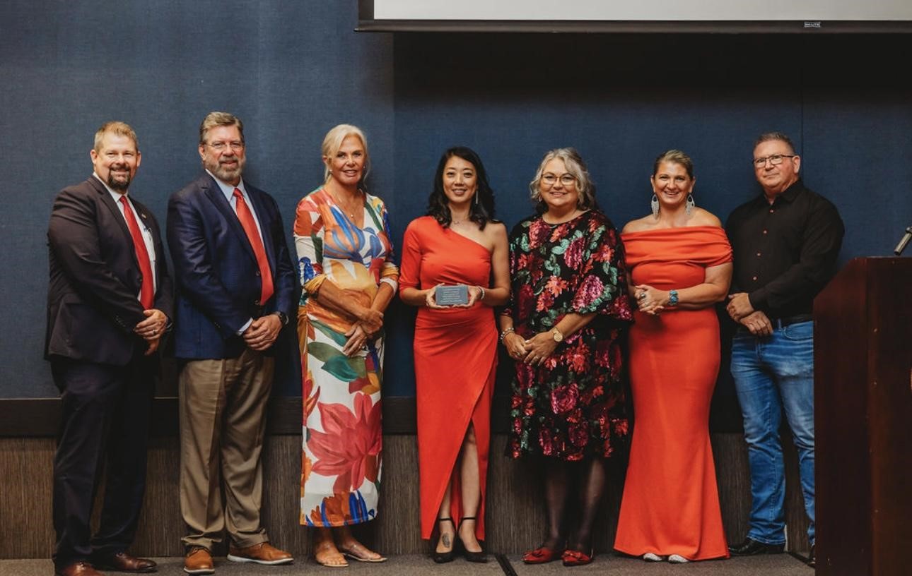 Lamberson pictured center with board members