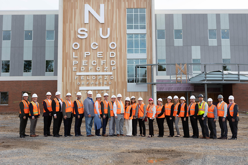 Regents and NSU Administrators in front of new NSUOCO building