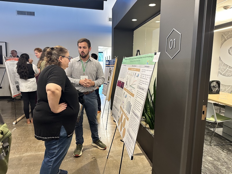 Spencer Largent presenting his poster at the OAS Annual Technical Meeting